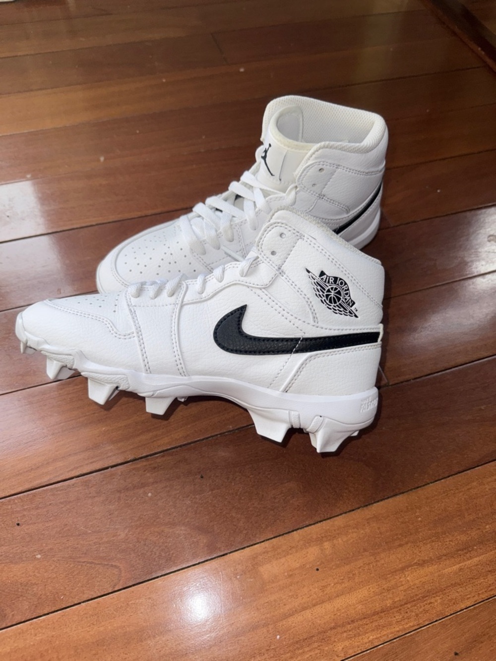 EUC Air Jordan 1 Kids White and Black High-Top Cleat Sneakers